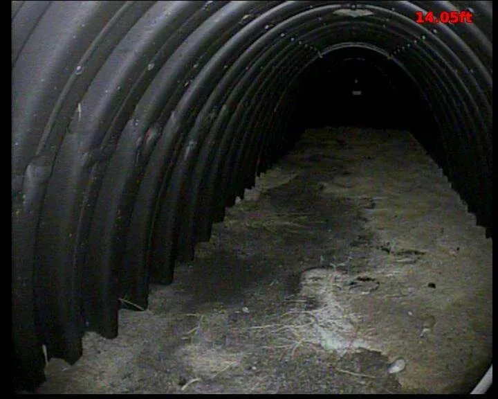 Camera view inside a septic structure during inspection